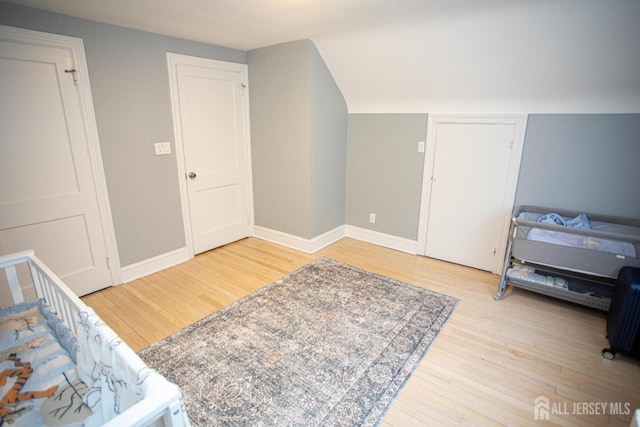 719 Charles St, South Amboy, NJ 08879 - bedroom featuring light wood-style floors and lofted ceiling