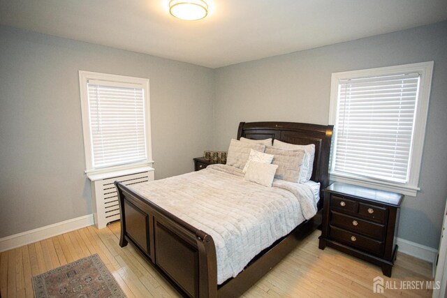 719 Charles St, South Amboy, NJ 08879 - bedroom featuring light wood-type flooring and baseboards