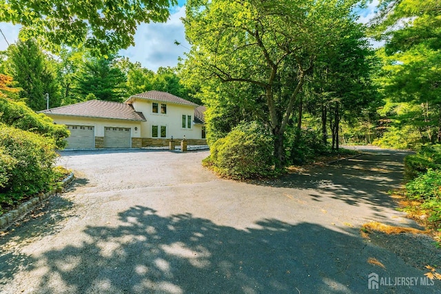 view of front of property featuring a garage