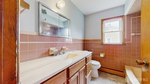190 S Moetz Dr S, Milltown, NJ 08850 - full bath with a baseboard heating unit, toilet, vanity, a tub, and tile patterned floors