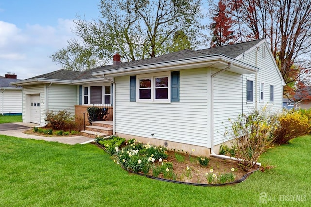 190 S Moetz Dr S, Milltown, NJ 08850 - single story home with an attached garage, a front yard, a chimney, and concrete driveway