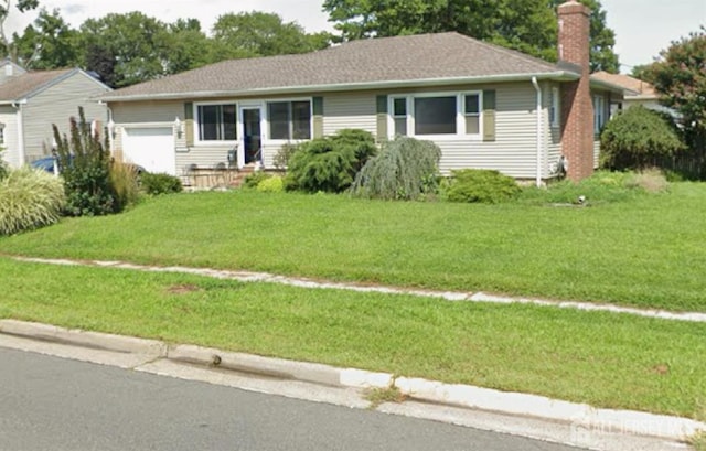 2907 Norwood Ave, South Plainfield, NJ 07080 - single story home with a chimney, an attached garage, and a front lawn