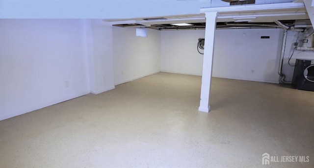 finished basement with washer / clothes dryer