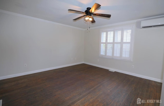 unfurnished room with ceiling fan, baseboards, an AC wall unit, ornamental molding, and dark wood finished floors