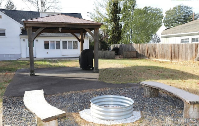 view of yard with a gazebo and fence