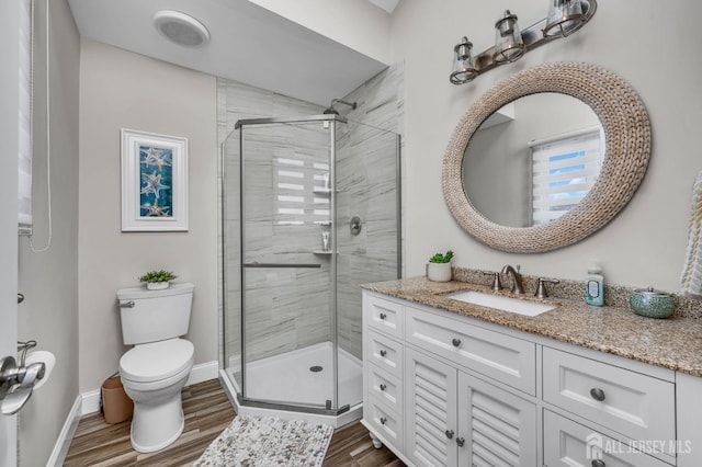 8 Bahia Ct, Brick, NJ 08723 - bathroom featuring vanity, wood finished floors, and a stall shower