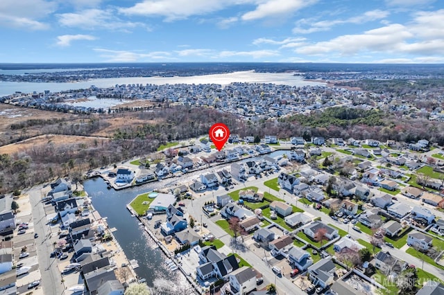 aerial view featuring a water view and a residential view