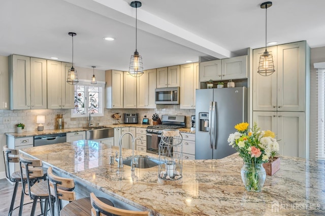 kitchen featuring recessed lighting, a sink, and stainless steel appliances