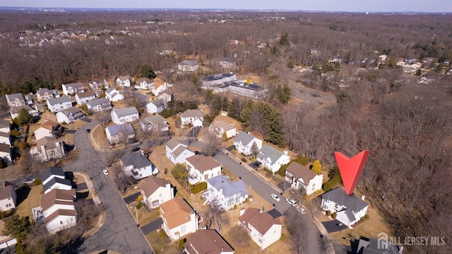 aerial view of property's location featuring nearby suburban area