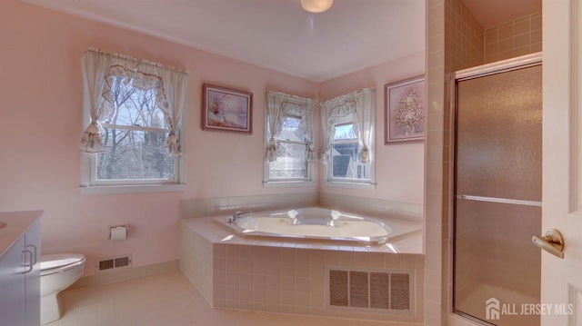 bathroom with tile patterned flooring, a bath, a shower stall, and toilet