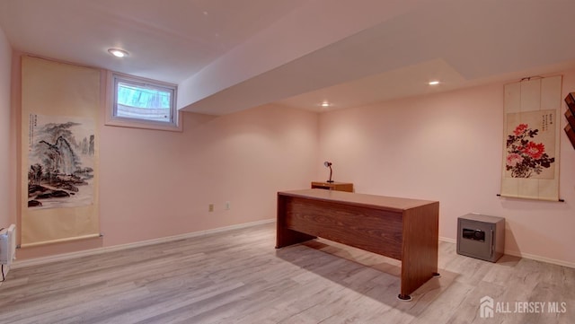office area with light wood-type flooring, baseboards, and recessed lighting