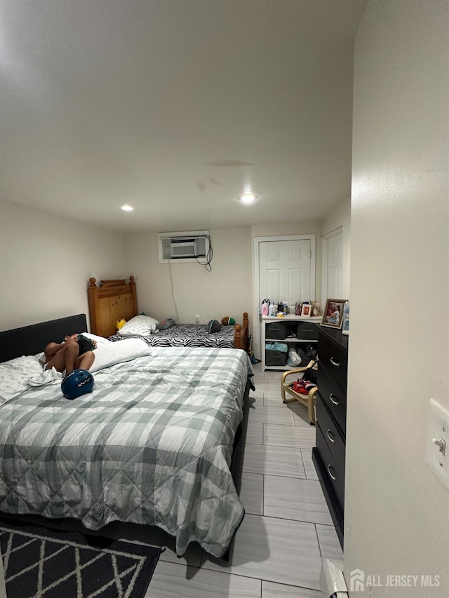 4 Fitzsimmons Ave, Middlesex, NJ 08846 - bedroom with a wall unit AC and recessed lighting