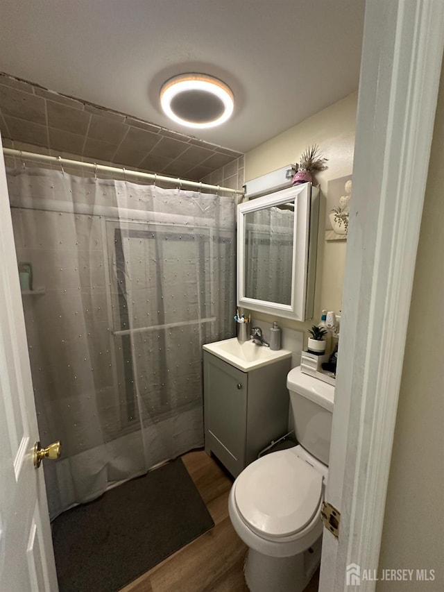 4 Fitzsimmons Ave, Middlesex, NJ 08846 - bathroom with vanity, wood finished floors, and a shower with curtain