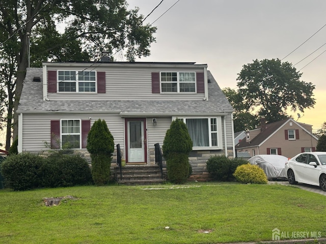 4 Fitzsimmons Ave, Middlesex, NJ 08846 - view of front of property with a yard, roof with shingles, entry steps, and stone siding