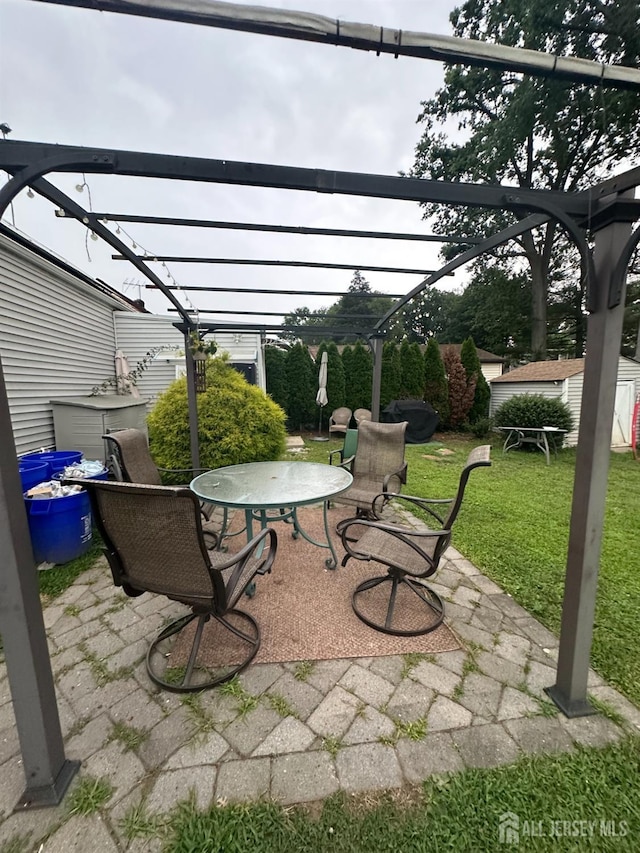 4 Fitzsimmons Ave, Middlesex, NJ 08846 - view of patio / terrace with a storage shed, a pergola, and outdoor dining space