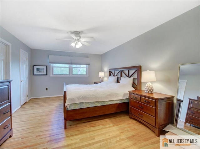 bedroom with light wood-type flooring, baseboards, and ceiling fan