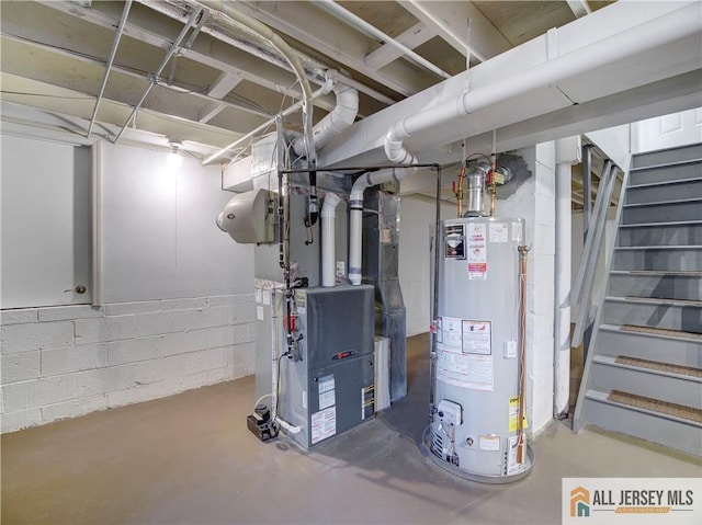 utility room featuring water heater and heating unit