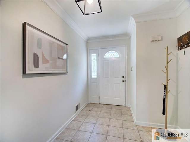 foyer featuring crown molding, baseboards, and light tile patterned floors