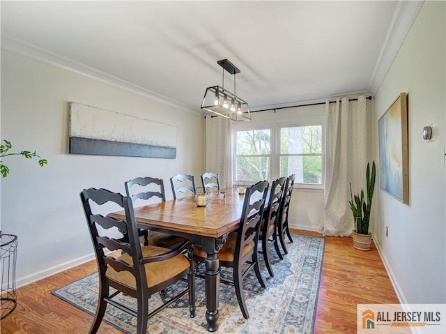 3 Camelot Dr, East Brunswick, NJ 08816 - dining space featuring ornamental molding, light wood finished floors, and baseboards