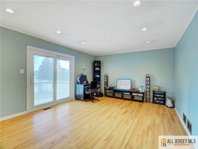 home office featuring wood finished floors, recessed lighting, baseboards, and ornamental molding