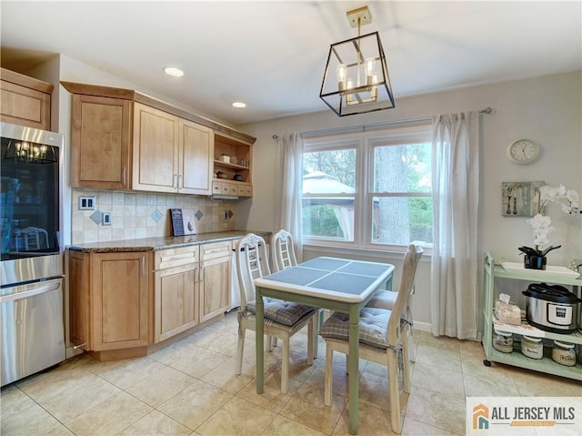 kitchen featuring smart refrigerator, decorative backsplash, stone countertops, light tile patterned flooring, and recessed lighting
