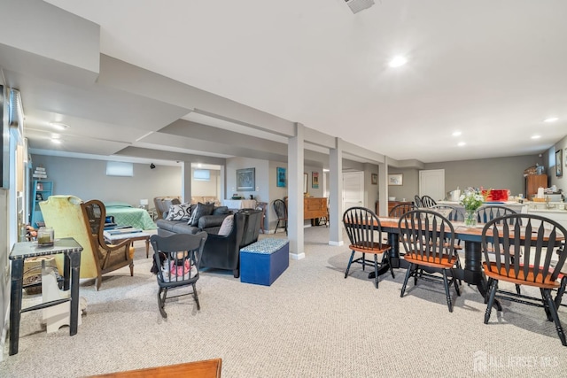 dining room featuring light colored carpet