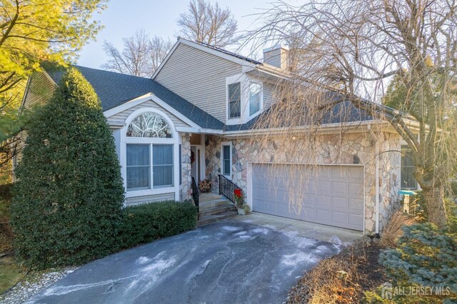 view of front of home with a garage