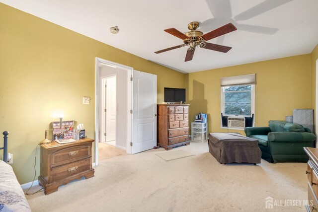 carpeted living room featuring ceiling fan and cooling unit