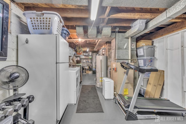 1 Highview Rd, East Brunswick, NJ 08816 - unfinished basement featuring gas water heater, freestanding refrigerator, and separate washer and dryer