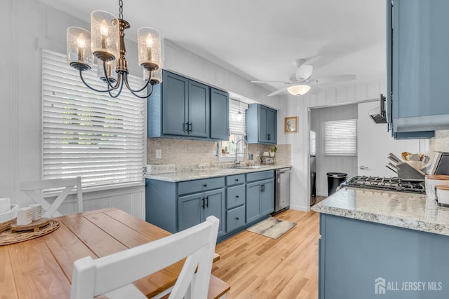 1 Highview Rd, East Brunswick, NJ 08816 - kitchen featuring a sink, a chandelier, blue cabinets, and ceiling fan