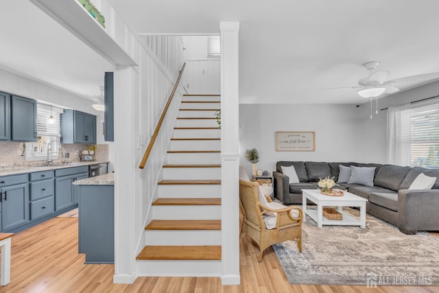 1 Highview Rd, East Brunswick, NJ 08816 - living room with stairway, ceiling fan, and light wood-type flooring