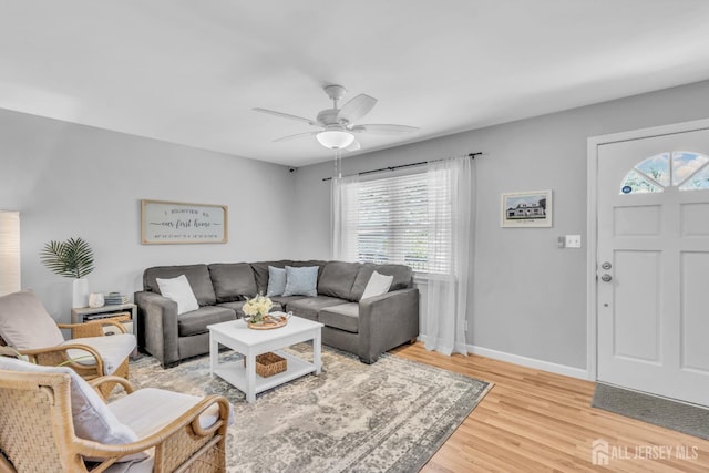 1 Highview Rd, East Brunswick, NJ 08816 - living area featuring light wood finished floors, ceiling fan, and baseboards