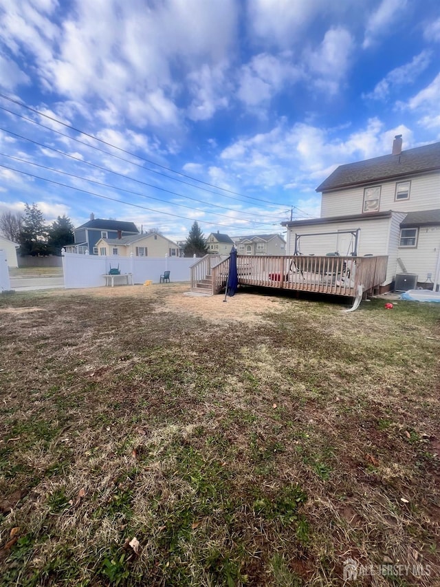 view of yard with a deck