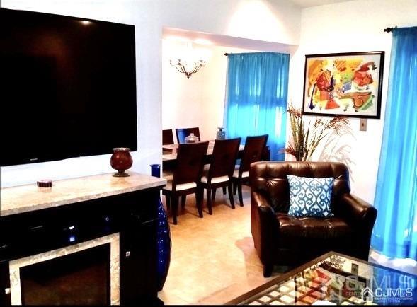 living room featuring tile patterned floors