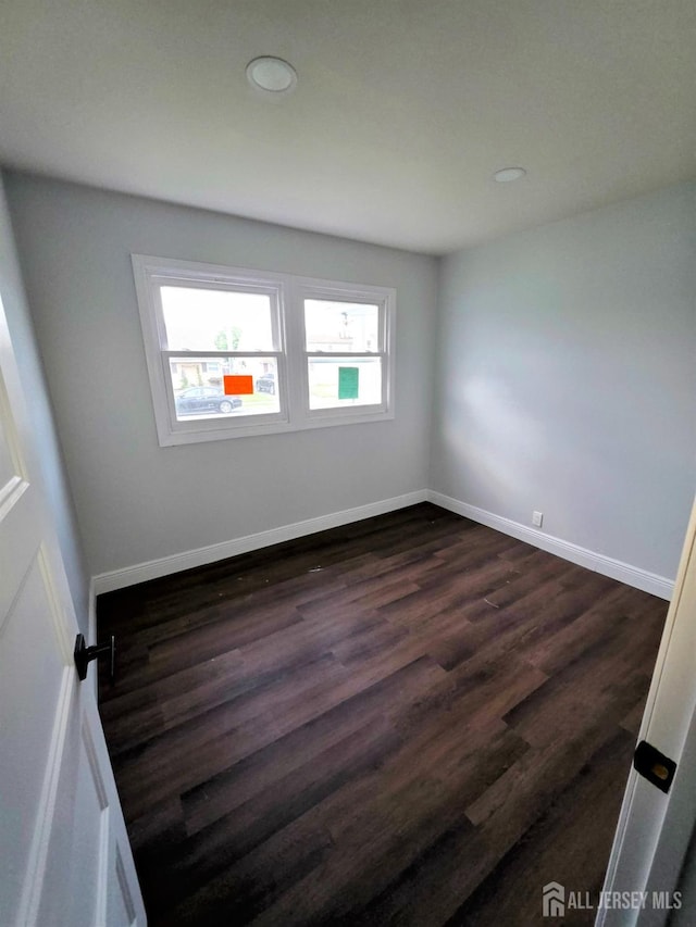 81 Hickory St, Carteret, NJ 07008 - unfurnished room featuring dark wood-style floors and recessed lighting
