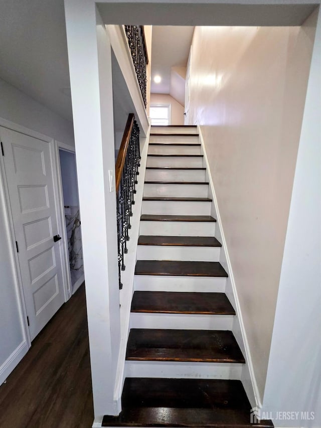 81 Hickory St, Carteret, NJ 07008 - stairway featuring wood finished floors