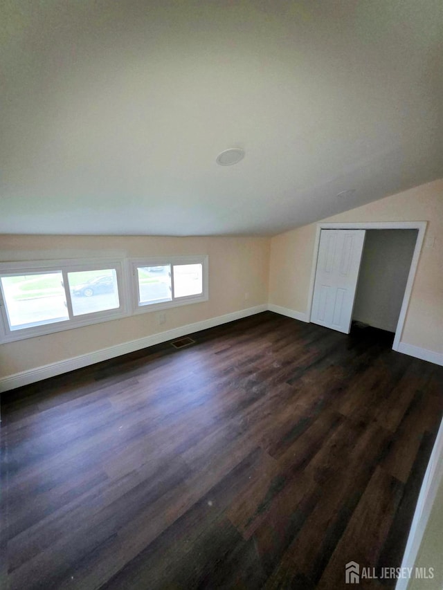 81 Hickory St, Carteret, NJ 07008 - bonus room featuring vaulted ceiling and dark wood-style flooring