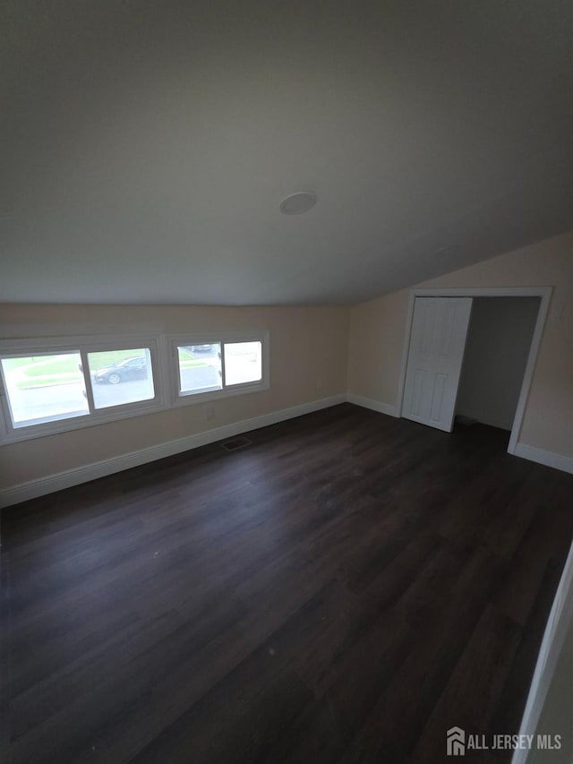 81 Hickory St, Carteret, NJ 07008 - additional living space featuring lofted ceiling and dark wood-type flooring