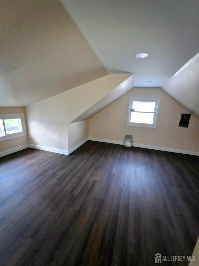 81 Hickory St, Carteret, NJ 07008 - bonus room featuring plenty of natural light, dark wood-style flooring, and vaulted ceiling