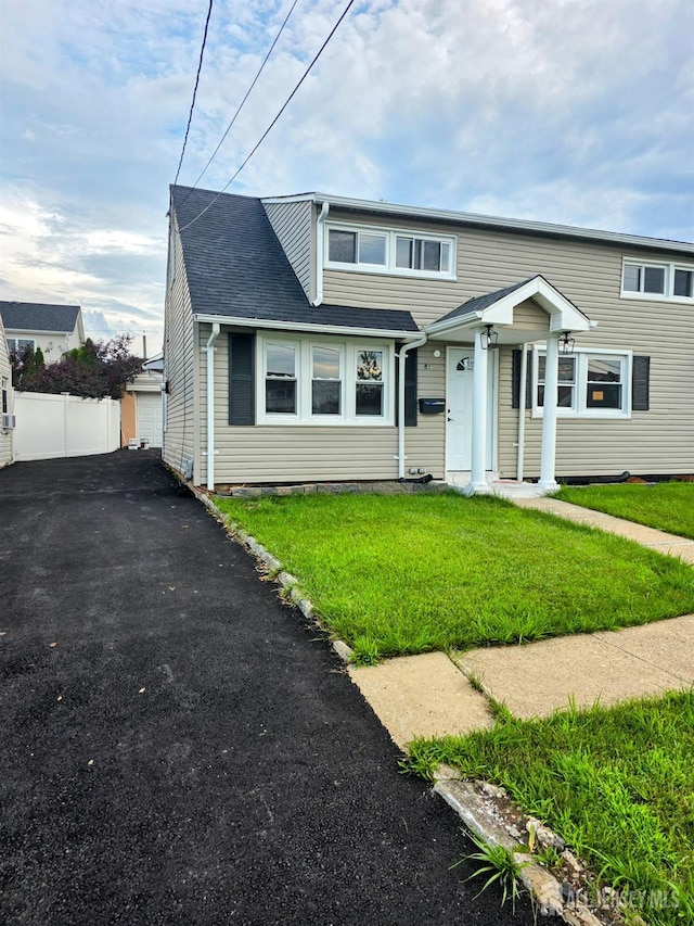 81 Hickory St, Carteret, NJ 07008 - view of front of house featuring roof with shingles