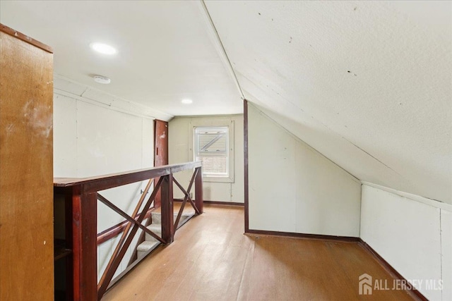 78 Bernard St, Carteret, NJ 07008 - bonus room featuring light wood-type flooring and vaulted ceiling