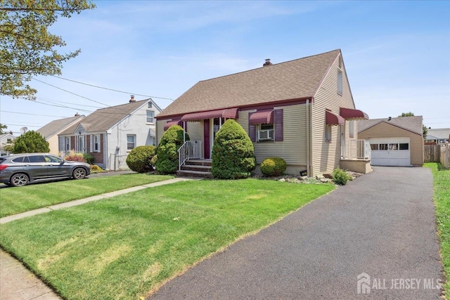 78 Bernard St, Carteret, NJ 07008 - new england style home with a front yard, roof with shingles, a chimney, and a garage