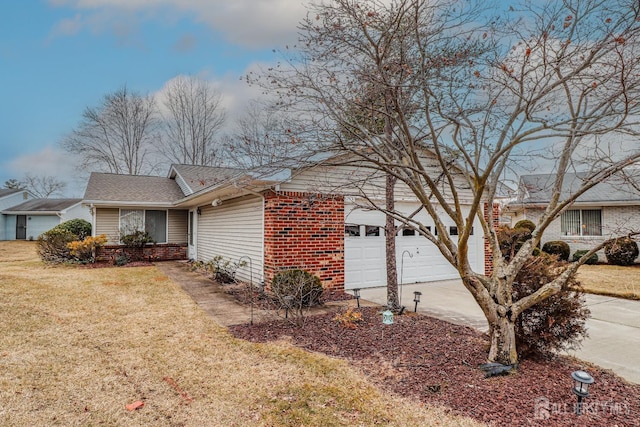 view of front of home with a garage, brick siding, concrete driveway, roof with shingles, and a front lawn