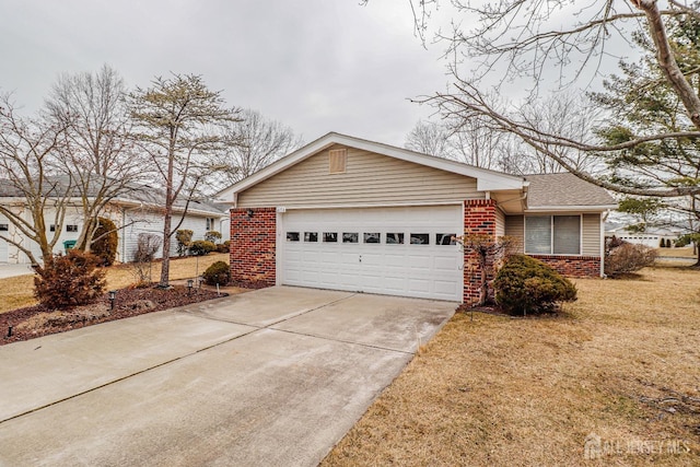 view of front facade with driveway, a shingled roof, a garage, and brick siding