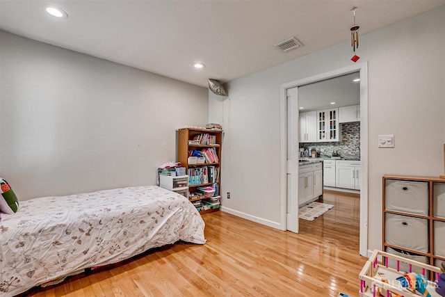 9 NW Fielding Pl, Edison, NJ 08820 - bedroom with light wood finished floors and recessed lighting