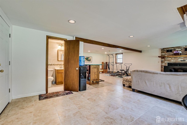 9 NW Fielding Pl, Edison, NJ 08820 - living room featuring a fireplace, recessed lighting, and light tile patterned flooring