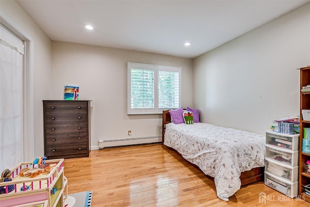 9 NW Fielding Pl, Edison, NJ 08820 - bedroom featuring baseboard heating, light wood-style floors, and recessed lighting