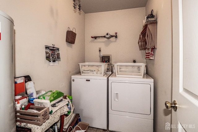 laundry room with washing machine and dryer