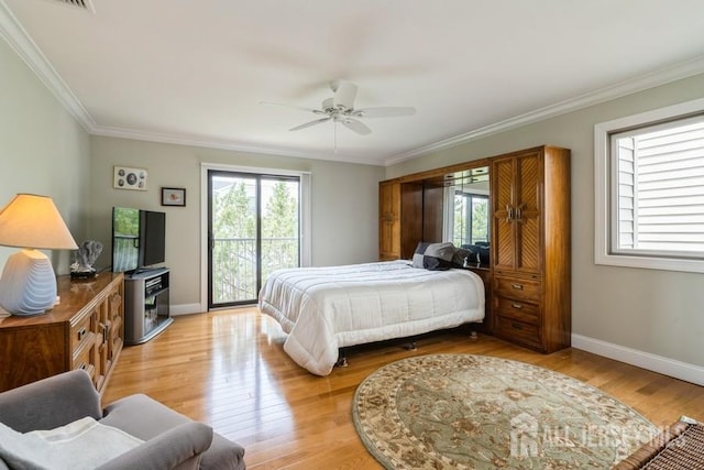 580 Patten Ave Unit 53, Long Branch, NJ 07740 - bedroom with multiple windows, crown molding, baseboards, and light wood-style flooring