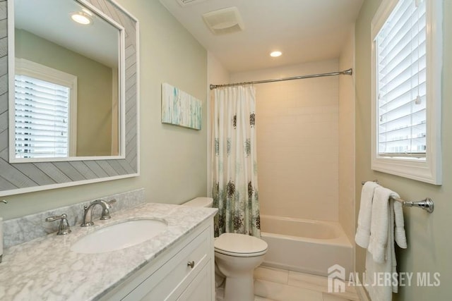 580 Patten Ave Unit 53, Long Branch, NJ 07740 - bathroom featuring toilet, vanity, healthy amount of natural light, shower / bath combo with shower curtain, and recessed lighting